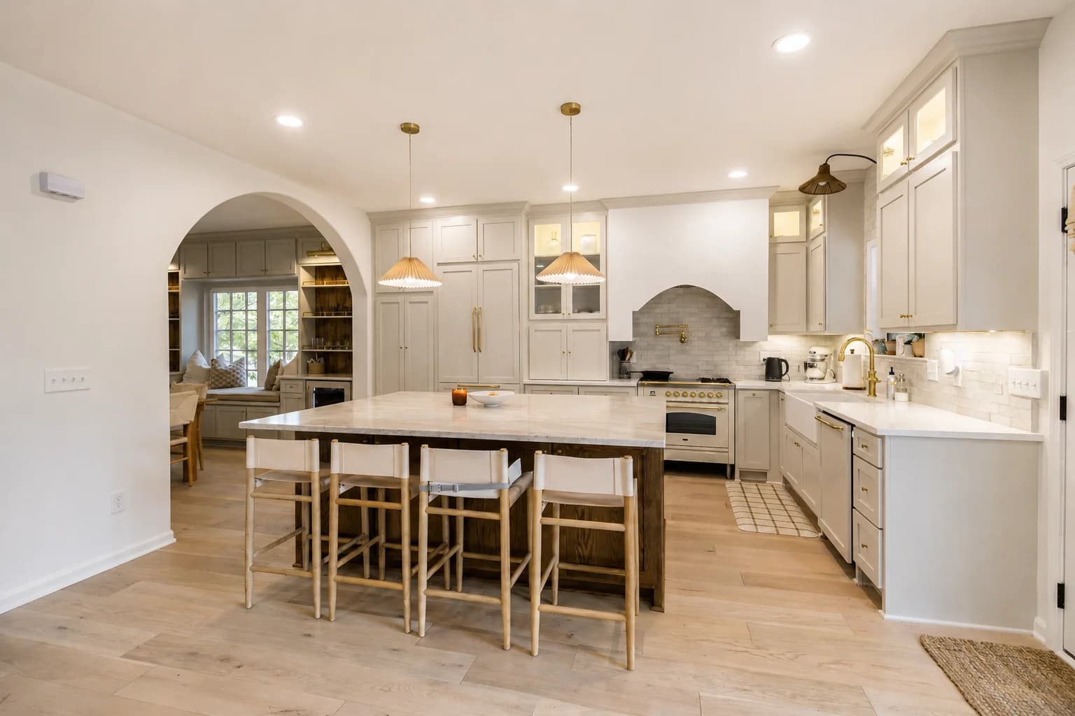 Kitchen with a gathering island — edited project photograph